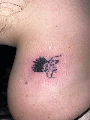 Doll her self did this tattoo of Gon Freecss from hunter hunter she did it super fast 10/10 recommend this tattoo shop