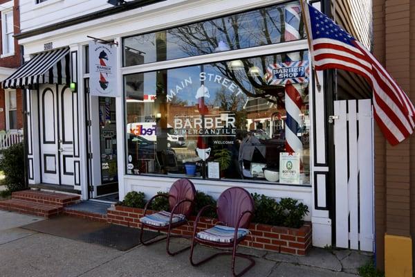 Sit outside the Main St Barbers and People watch!