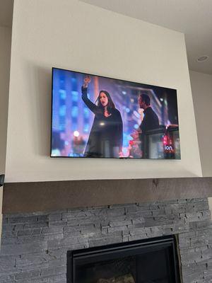 Tv mounting on fireplace