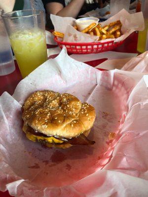 Bacon cheeseburger with Cajun fries