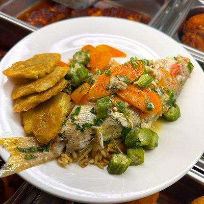 Red Snapper steam down in a coconut sauce.