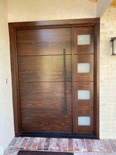 Accoya stained modern with v-grooves and active sidelight
 Frosted glass