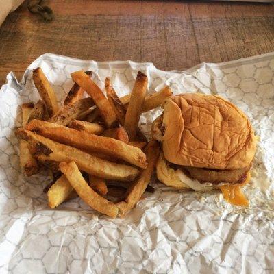 Rodeo Chicken Sandwich. Fried chicken w/ cheddar cheese, bacon, onion rings, BBQ sauce, and ranch dressing. Comes w/ fries. Yes please.