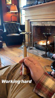 Enjoying a cigar in the lounge