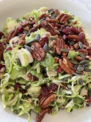 Brussel Sprout Salad with Glazed Pecans, Dried Cranberries, Pumpkin seeds with House made maple mustard dressing