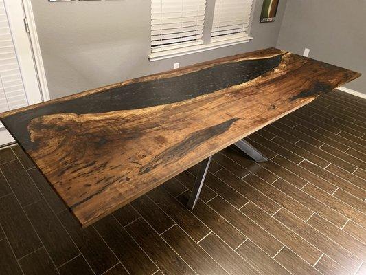 Native Texas pecan live edge and epoxy resin river table. Steel base locally sourced.