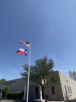 A permanent fixture here at Lyons Manufacturing! 
Our new flag pole has a tough job ahead, facing these north Texas winds!