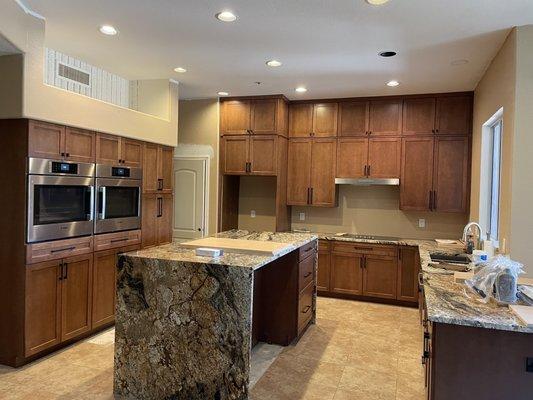 Lots of storage- cabinets stacked to ceiling.