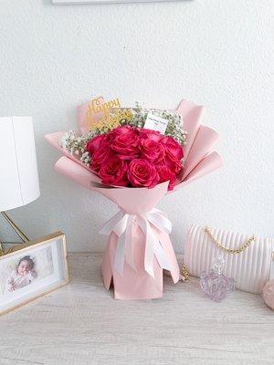 Blush and Bloom hot pink roses accompanied by baby breath and soft pink korean floral paper