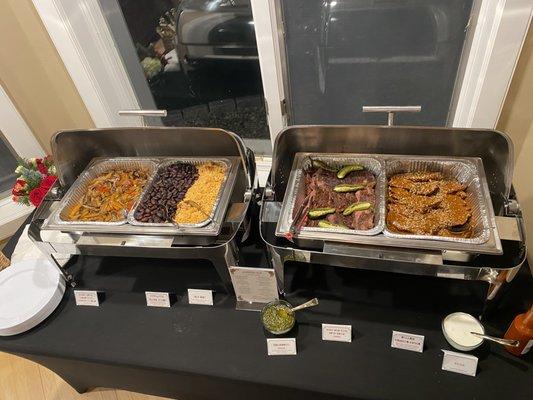 Buffet style dinner party with Prime NY Strip Asada, Organic Chicken in Pipian Sauce, Heirloom Beans and Rice, and Fajita Style Veggies.