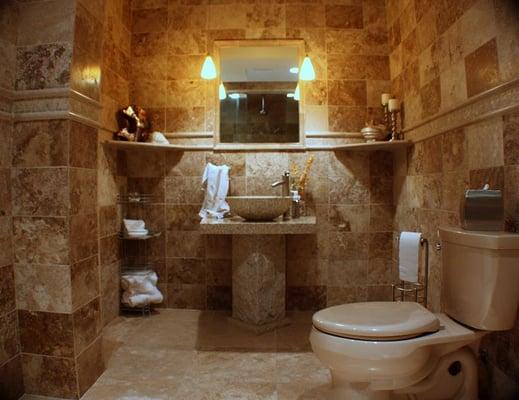 Travertine Bathroom with pedestal sink