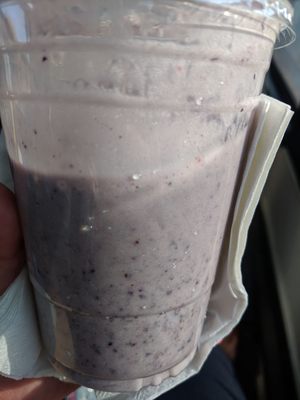 Banana, blueberry and strawberry smoothie with milk