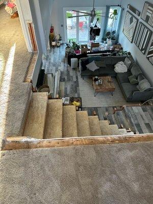 Open stairs down to concrete floor.