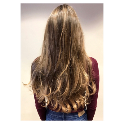 Very subtle, natural blend of balayage highlights for this beautiful brunette!