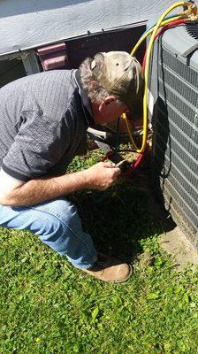 trouble shooting equipment checking refrigerant making sure system is running properly