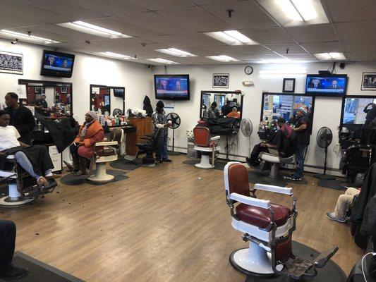 Topnotch Barber Shop 1855 Washington St. come in our book appointment