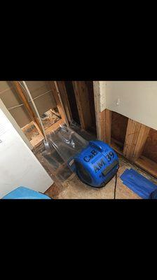 A good indication of a failing hot water heater is a puddle of water underneath it and a rotted subfloor.