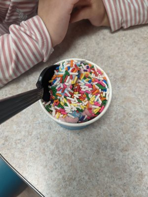 Cotton candy ice cream with rainbow sprinkles