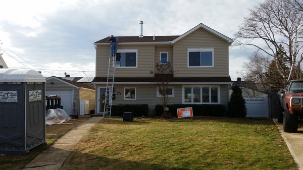 Double dormer, back cantilever, roofing, siding, windows, all interior finishes. (after)