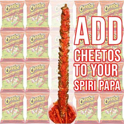 Spiral potato with salsa valentina, crema and covered on crumbs of hot cheetos