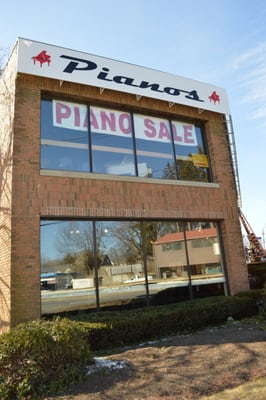 Side of Roger's Piano facing east bound traffic on Route 9.