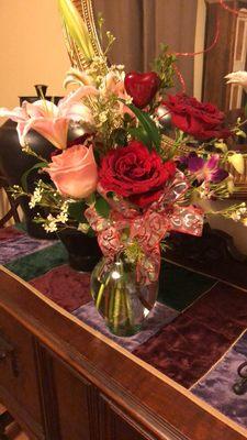 Red roses and a vase full of sunshine!!