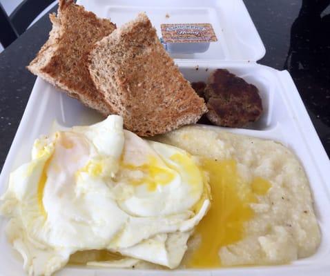 $3!!! TURKEY SAUSAGE, EGGS OVER EASY, GRITS & WHEAT TOAST, its gotta be over a pound of food. With a cold drink after tax: $4.30