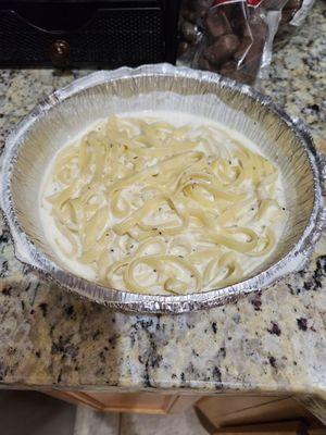 Fettuccine Alfredo.  Usually almost equally as full as the spaghetti.