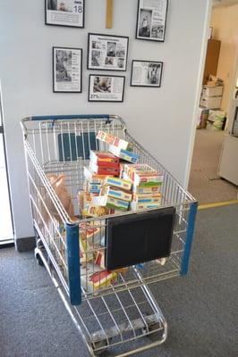 Old shopping cart used to collect food for Paz de Cristo each week.