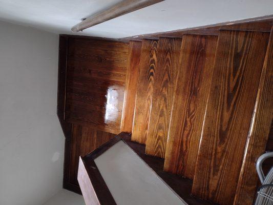 Stained antique heart pine stairway.