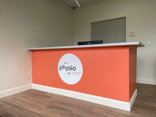 Front desk signage at Physio Physical Therapy is up and ready to help you