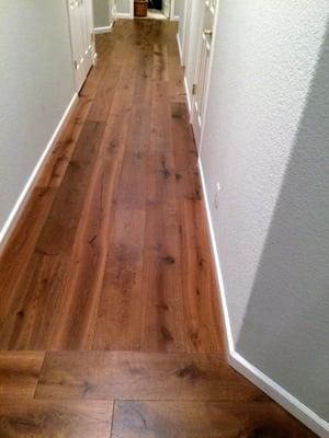 hardwood floors are unique and easy to customize to your homes layout. Direction change adds a custom feel to long hallways.