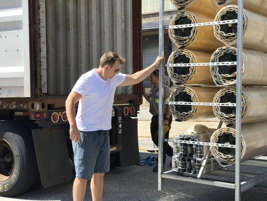 Byron helping unload our latest shipment