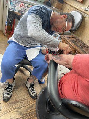 Joe tattooing my Dad