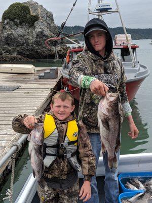 Colton and Caleb with some fish they caught on the windrose.  Our family loves captain Kurt and crew.