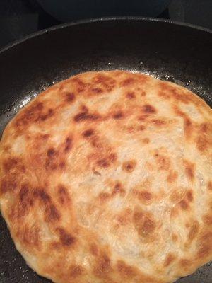 Flaky Kerala paratha bread, think croissant flatbread