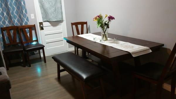 I love this dining table. It came with 4 chairs and a bench. Great quality and very stylish.