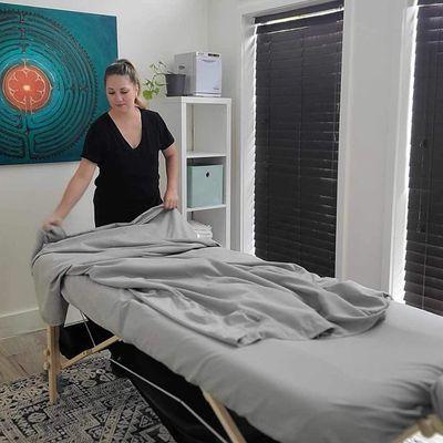 Prenatal massage table and our massage therapist.