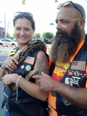 Brak, a 6' boa, was adoption by this couple when original owner became ill. Brak is a therapy snake to help with snakes phobias.