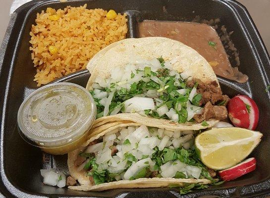 4.99 taco plate - 2 tacos of choice with rice and beans