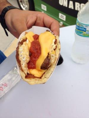 Pancake taco - skirt steak, egg, cheese and special red sauce