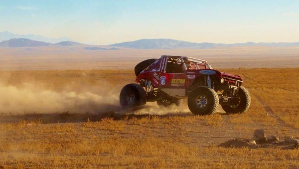 #4437 Ultra4 Bronco style race buggy blasts past in the Nevada desert