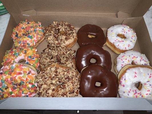 Dozen donuts - fruity pebbles, Carmel pecan, chocolate yeast, vanilla yeast