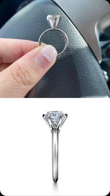 Above is the ring we got. Below is the example photo provided. The setting on our ring effectively DOUBLED the height of the stone.