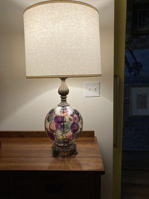 The owners found this beautiful, colorful 70's globe and turned it into a lamp!  It's on our bedroom dresser.  Love it!