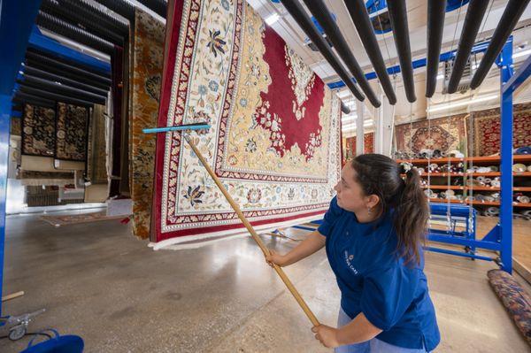 Rugs are hung to dry and brushed to retain a soft pile.