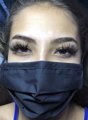 Hybrid lash extensions and eyebrow wax.