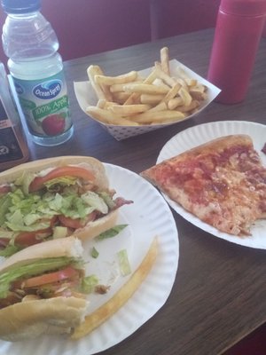 This place is a neighborhood gem! Chicken club, small fries, cheese slice.