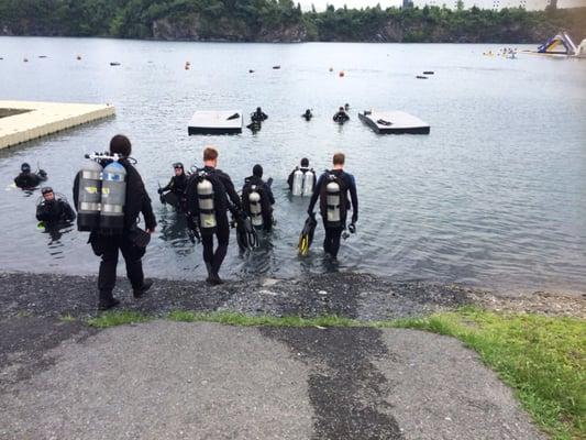 Students getting into water