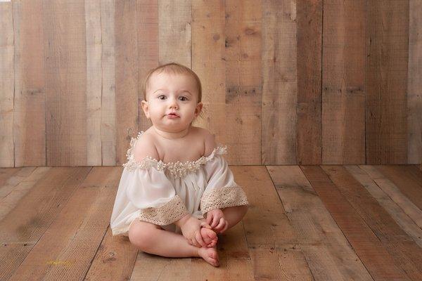 15 month old baby girl in studio.